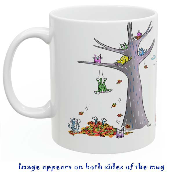 cats jumping in leaves mug